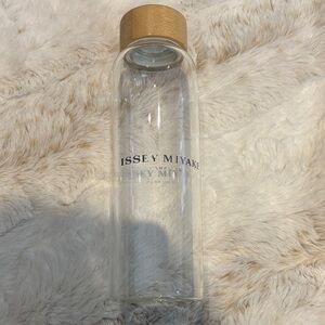 Issey Miyake Clear Glass Bottle with Light Wood-Tone Cap